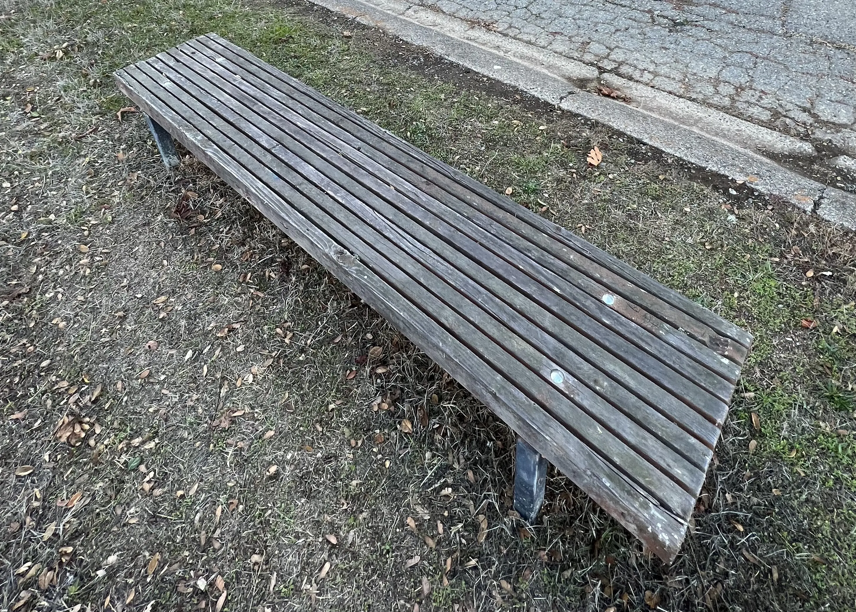 Wooden park bench with slats